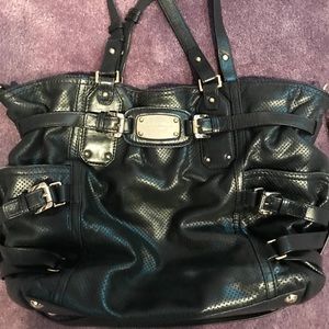 Black Michael Kors trendy purse with gold hardware